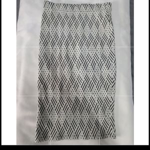 2/25$ 🛍 Patterned Midi Skirt